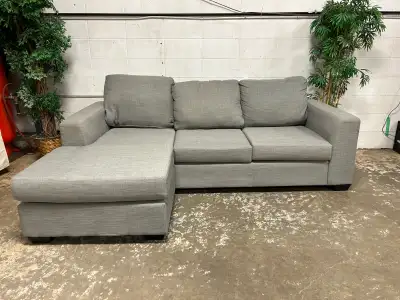 Beautiful Light Grey The Brick Reversible Sectional with no rips or tears. Comes from a smoke and pe...