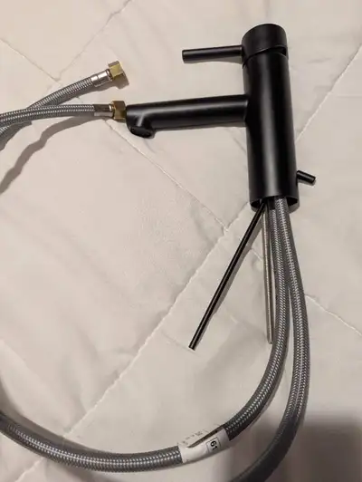 Brand new moen black bathroom faucet No box but all the pieces are there Never installed or used 609...