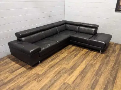 Natuzzi black leather sectional. FREE DELIVERY , View more