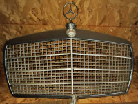 Vintage 1976 Mercedes Benz W114 grill & hub caps