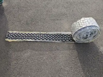 5/8 in depth x 7 in w. x 33 ft long . Could be used to make tracks or used to wrap a steel wheel rim...