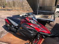 His and hers Yamaha Apex's with enclosed trailer
