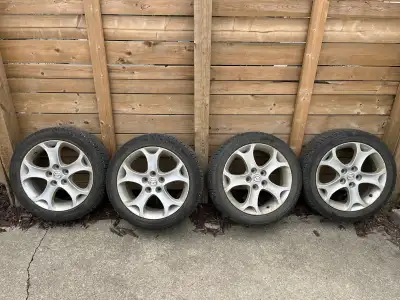 Set of four Michelin X-Ice winter tires for sale with Mazda alloy rims. Were on a Mazda 5 hatchback...