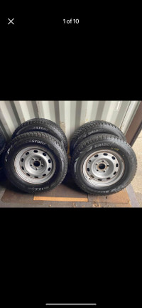 Set of 4 NEW BRIDGESTONE winter tires rims(245 70 17) pattern (5