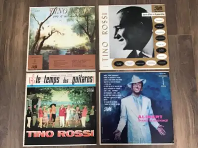 A vendre trois albums de Tino Rossi et un album de Alibert , demande $40.00 pour les quatre mais peu...
