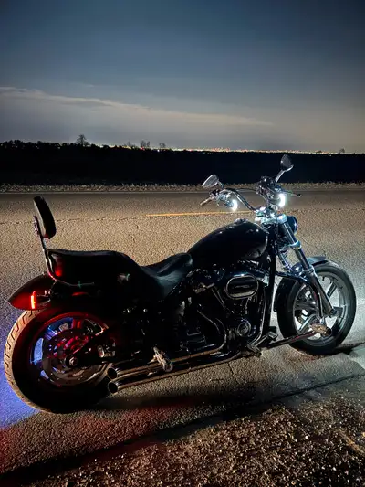 One of a kind custom Softail. Custom pegs, engine guards, custom switch housings, custom switch hous...