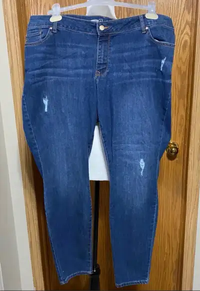 Plus size women’s distressed rockstar jeans, View more