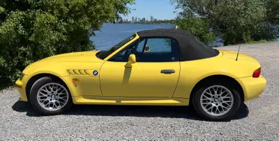 Unique version of the 1998 BMW Z3 with 2.8L engine. It’s Dakar Yellow with yellow piping on the all...