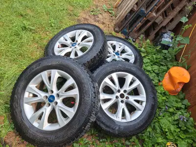 These are a set of used Ford rims that fit a Ford Escape. They are in good condition and ready for y...