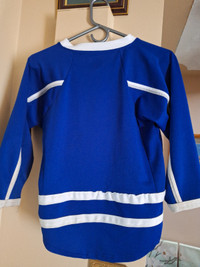 Youth size small leafs jersey