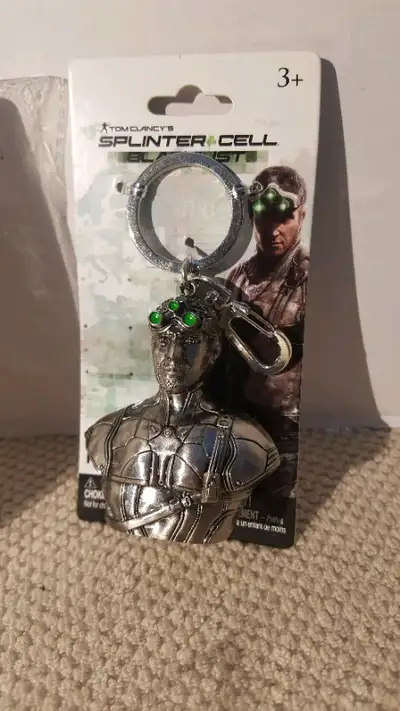 Porte clée  Tom Clancy's Splinter cell neuf, View more
