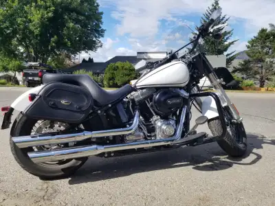 Excellent condition HD bobber . The bike is wrapped in white. The original color under the wrap is a...