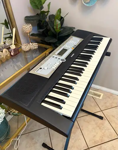 YAMAHA PIANO IN EXCELLENT CONDITION & STAND , View more