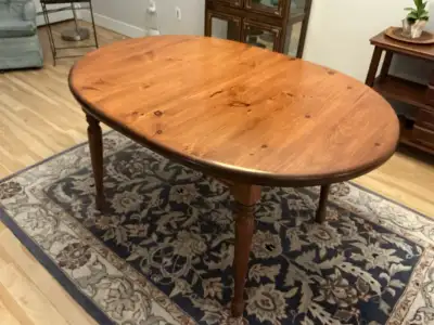 Wood dining table. Includes 2 leafs. Table seats 8. , View more