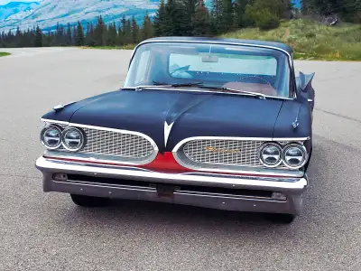 I have 2 Different vehicles for trade. One is a 1959 Pontiac Custom and a 1934 Fraser Nash Replica.....