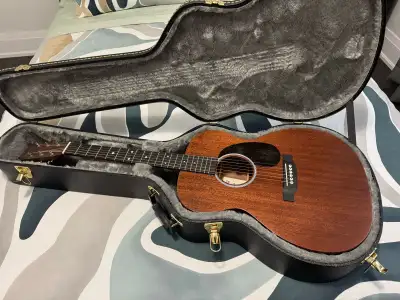 Selling my Martin D10e in mint condition, comes with a hardshell case, humidifier, built in tuner, a...