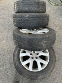 Uniroyal Tiger Paw  - 235/60r18 All-Season tires with Mazda rims