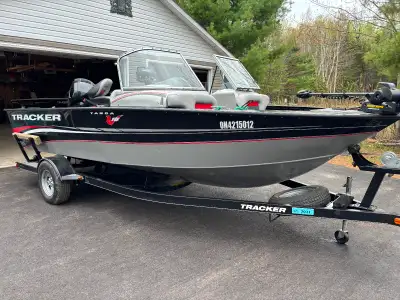 Tracker with 150 Merc 4 stroke and 9.9 Merc 4 stroke kicker . Minn Koda power drive V2 I pilot troll...