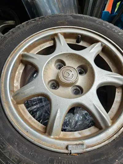 I am selling a set of four Miata tires, complete with rims. These tires are in used condition, and a...