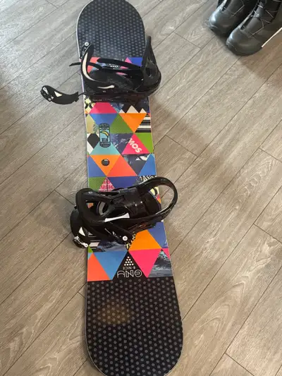 women’s GNU snowboard and bindings, View more