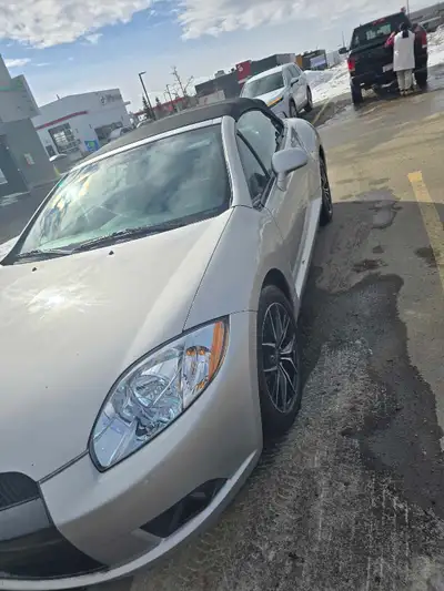 2012 it's a Mitsubishi spider eclipse convertible. Motor 2.4 L. Have brand new backup cam.I'm still...