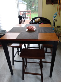 Bar height table with 4 stools