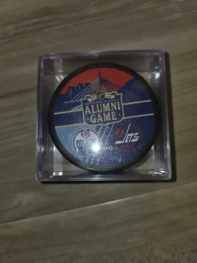 Oilers Jets Alumni Puck, View more