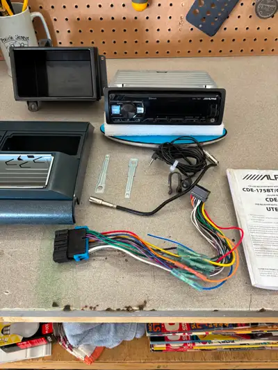 Alpine Bluetooth stereo with installation harness and dash panel. Was in my 1992 Chevrolet pickup.....