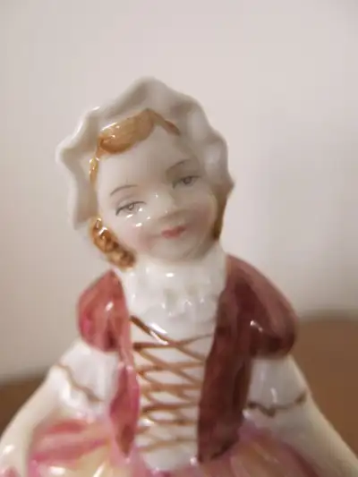 From a pet free and smoke free home. For sale a ROYAL DOULTON figurine named DINKY DOO, item number...