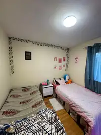 Room for rent for one girl in sharing