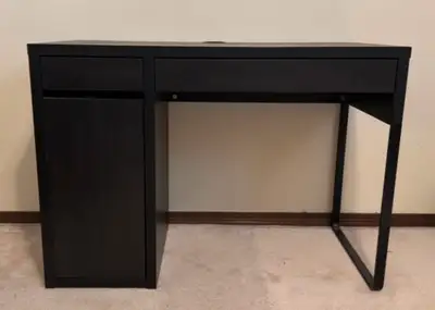 Ikea Desk (black/brown) in great condition - $80 Dimensions - 41x30x20 inches No pet/no smoking home...