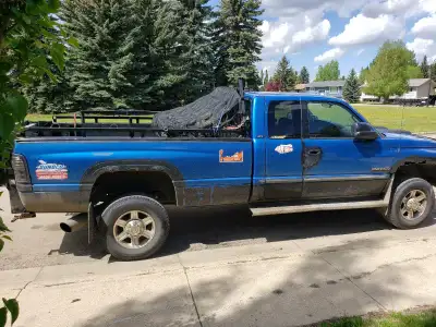 2000 Dodge Ram SLT Laramie HO 5.9 Cummins diesel 4x4 automatic transmission, As you can see in the p...