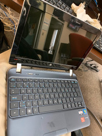 HP laptop with charger and Samsonite bag - pick up Sunday