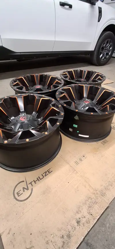 Fuel Assault rims 20x10 (5x139.7/5x150 bolt pattern) asking $800 Setof 4 Firestone Teansforce AT tir...