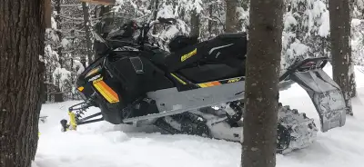 Get ready to conquer the snow with this Ski-Doo MXZ Blizzard! This performance snowmobile is designe...