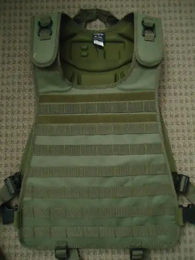 Light use Solid BT molle hard protective padding vest, Med/ L/ XL size. 70 bux. i have attachments p...