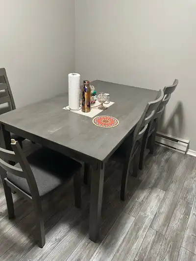 Very well in condition with 4 chairs and 1 sitting table.