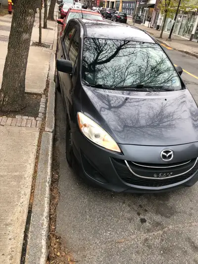 Mazda 5 , 6 places, 2012, bonne état, beaucoup de réparation faites. Appel 819-967-4503
