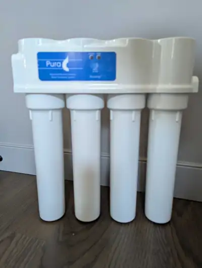 1240 Series Reverse Osmosis Drinking Water System Comes with unused faucet. Worked great for us. Com...