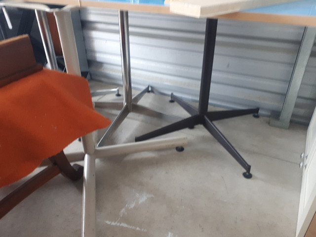42 inch  dia  tables  with steel bases  $ 30  each in Other Tables in Brantford - Image 2
