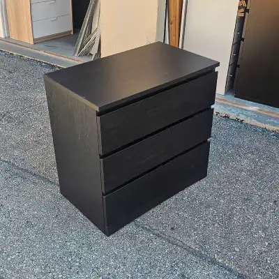 Black Malm Dresser. 31" Wide. Already Assembled to save your time and Efforts. All drawers work perf...