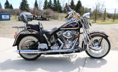 1998 Heritage Springer (2 perfect motors) 1 owner from new to 2026 Comes with factory saddlebags tak...