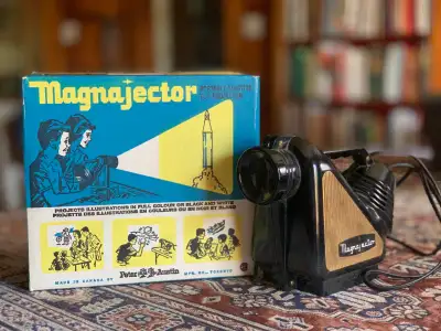 Projects images using old school 60 watt light bulb. Great tool for artists and crafters for transfe...