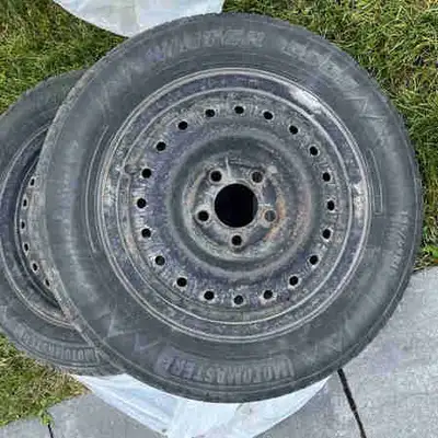 A pair of rims, the tires are used up but the rims could be perfect for you Size 195/65 R15