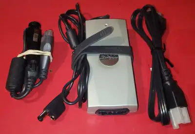 Dell AC/DC laptop power supply, model number HP-AF065B83. Power output: 19.5 volts, 3.34 amps. 5.0 m...