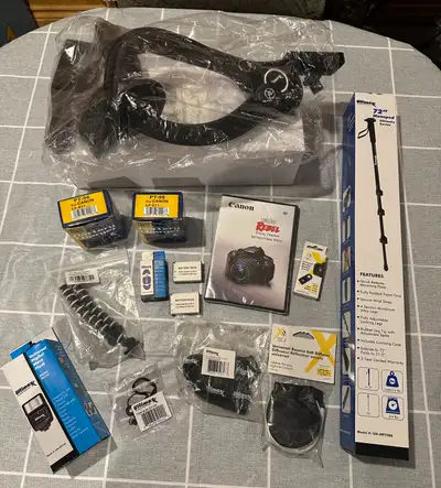 BRAND NEW NEVER USED Lot Includes: -Ultimaxx Shoulder Stabilizer -Ultimaxx 72" Monopod -2 Battery Pa...