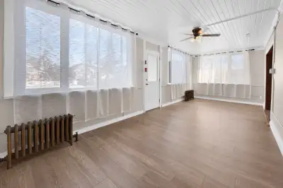 Renovated, 2 br suite , eat in dinining room,2 livining rooms. Loads of light, huge laundry room (no...