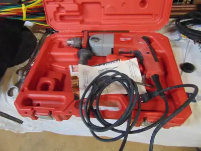 MILWAUKEE 1/2 INCH HAMMER DRILL EXCELLENT WITH CASE, View more