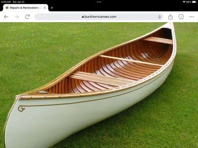 Langford cedar strip canoe. 100 % Restored by Buckhorn Canoe Company in 1999. Storage since that tim...