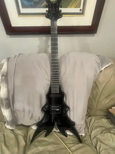 B.C. Rich Draco w coffin case - $1,400 obo, View more